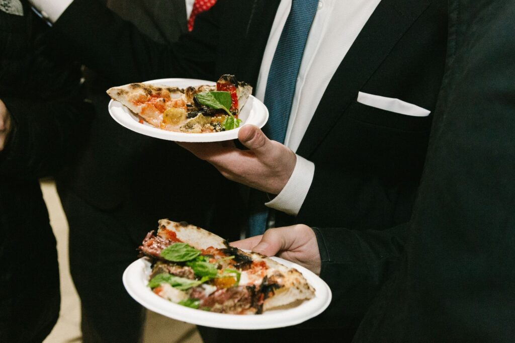 Guests eating pizza